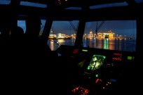 Patrouille vaartuig in de nacht Port of Amsterdam